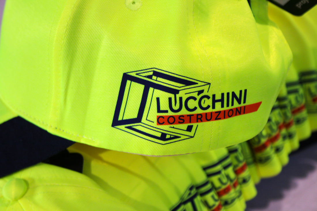 Lucchini Costruzioni: Cappellini ad Alta Visibilità Giallo Fluo - ZIPPOPIU